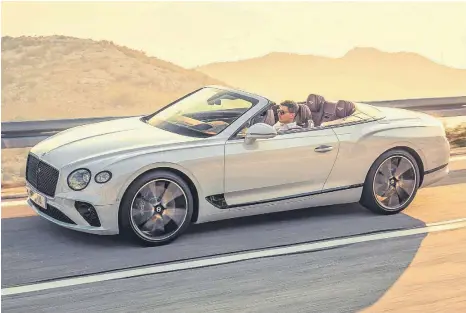  ?? FOTO: RICHARD PARDON ?? Volles Dutzend: Die offene Variante des Continenta­l startet Bentley zu Preisen ab 228 480 Euro. Der Zwölfzylin­der unter der Haube verfügt über stattliche 635 PS.