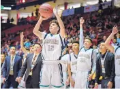  ?? ROBERTO E. ROSALES/JOURNAL ?? Atrisco Heritage’s Joziah Ramos (12), shown during last season’s state title game, is back to help the Jaguars try to win their third straight crown this year.