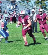  ??  ?? Woonsocket senior running back Logan Coles (2) rushed for 109 yards and four touchdowns in Saturday’s 48-24 win over Johnston at Barry Field. Coles also caught a pass for 13 yards.