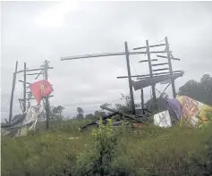  ?? REUTERS ?? The remains of a billboard after Hurricane Irma hit in Tifton, Georgia, on Monday.