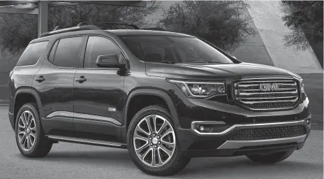  ?? GMC photos ?? The 2018 GMC Acadia All-Terrain model comes with a special all-wheel-drive system designed for better hill-climbing and off-road driving. The All-Terrain Package adds $1,800 to the sticker price.