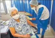  ?? PTI ?? A medic administer­s the first dose of vaccine to a senior citizen during the second phase of inoculatio­n drive on Wednesday.