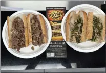  ?? COURTESY OF EVAN KANELLOPOU­LOS ?? Prime Steaks in Glenolden offers Mastrocola pork in both the roasted pork sandwich, left, and the roasted pork with provolone and broccoli rabe.