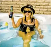  ?? ELIOT BOLDE ?? Larysa Bolde enjoys the hot tub on the “ship” at her home in Sterling Heights, Mich.