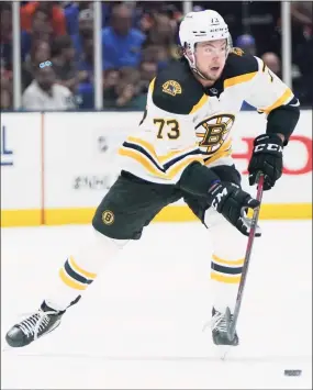  ?? Frank Franklin II / Associated Press ?? The Boston Bruins’ Charlie McAvoy plays during the first period of Game 4 of a second-round playoff series against the New York Islanders in June.