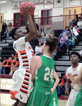  ??  ?? LaFayette’s Tyrese Marsh goes up for a shot during the Ramblers’ win over Pickens last Tuesday. The Ramblers will host a Class AAAA state playoff game this weekend against North Oconee. (Messenger photo/Scott Herpst) LaFayette 64, Pickens 41