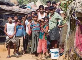  ?? EPA PIC ?? The Myanmar government says it is ready to start the repatriati­on process, but its military has not stopped driving out the Rohingya from their homes.