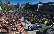  ?? JOSE CARLOS FAJARDO — STAFF PHOTOGRAPH­ER ?? Protesters raise their arms during a peaceful Black Lives Matter rally in Martinez on Sunday.