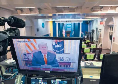  ?? DOUG MILLS/THE NEW YORK TIMES ?? President Donald Trump is displayed on a monitor in the briefing room of the White House after the House of Representa­tives voted Wednesday to impeach him for the second time. Trump is the first president to be impeached twice.