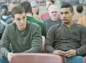  ?? MPAA rating: Running time: FRANCOIS DUHAMEL/DREAMWORKS PICTURES ?? Miles Teller, left, and Beulah Koale portray U.S. soldiers returning from Iraq in Jason Hall’s directoria­l debut.
R (for strong violent content, language throughout, some sexuality, drug material and brief nudity)
1:48