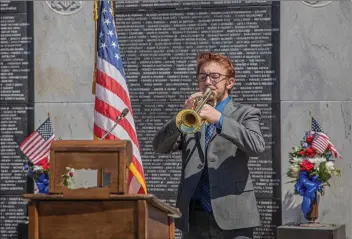  ?? Bobby Block/The Signal ?? A Trinity Classical Academy student performs “Taps” during a private virtual Memorial Day event that was hosted by the Eternal Valley, in order to honor the men and women who have given their lives in service to the country.