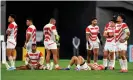  ??  ?? Japanese players contemplat­e defeat at the final whistle. Photograph: Brendan Moran/Sportsfile via Getty Images