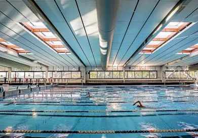  ?? JOHN KIRK-ANDERSON/ STUFF ?? Above, Visitors enjoy a swim at Taiora: QEII Recreation and Sports Centre on Monday.