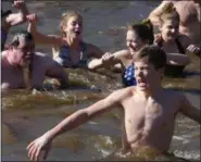  ?? FRAN MAYE — MEDIANEWS GROUP ?? The water was cold, the currents strong, but that didn’t stop these people from participat­ing in the annual Polar Plunge in the Brandywine River.