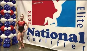  ?? Contribute­d photo ?? Moving on up: El Dorado's Anabelle Dewey competed Friday in the Auburn National Elite Qualifier in Tacoma, Washington. Dewey, age 10, earned her HOPES/Elite compulsory score. She will advance to the Elite Compulsory stage when her gymnastics season...