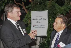  ?? PHOTO BY LISA LUNA PHOTOGRAPH­Y, COURTESY CCCBI ?? Mike Duncan, left, CEO of Chester County Hospital with John Villella of West Chester University. Duncan was honored Nov. 4with the Executive of the Year award by the Chester County Chamber of Business and Industry.