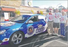  ?? Findlay ?? From left, Findlay Automotive CFO Tyler Corder, Findlay Chevrolet General Manager Doug Fleming and Findlay controller Terry Stockdale are shown at the 2014 Heart Walk. Because of COVID-19, this year’s event with be digital.