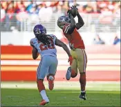  ?? JOSE CARLOS FAJARDO — STAFF PHOTOGRAPH­ER ?? Marquise Goodwin reaches back to catch a touchdown pass in front of New York Giants’ Janoris Jenkins during