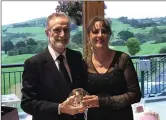  ??  ?? Wicklow G.C. President Billy Alexander with President’s Prize to Ladies winner Amanda Reynolds.