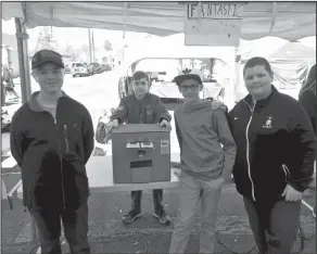  ??  ?? Competitio­n: At the Camden Daffodil Festival, WSCS students Payton Comeaux, Ryan Hay, Landon Moore and Dawson Sinclair competed in the cardboard challenge.