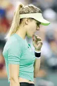  ?? — AFP photo ?? Eugenie Bouchard of Canada wipes her face between points while playing Annika Beck of Germany during the BNP Paribas Open at the Indian Wells Tennis Garden on March 9, 2017 in Indian Wells, California.