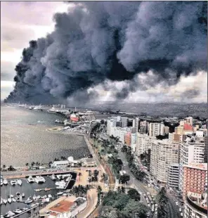  ?? PICTURE: STORM REPORT/MARK PHILIPS ?? A BURNING ISSUE: The effects of chemical pollution on human health – such as when a Transnet warehouse containing wax and plastic was razed in a fire in Rossburgh last month – are amenable to scientific analysis and solution.