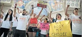  ?? CHRISTIAN GOODEN/AP ?? Abortion-rights activists in Missouri react Friday after lawmakers approved HB126.
