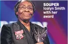  ??  ?? SOUPER Icolyn Smith with her award