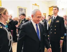  ?? REUTERS ?? Israel’s Prime Minister Benjamin Netanyahu departs after delivering joint remarks with U.S. President Donald Trump on a Middle East peace plan proposal in the East Room of the White House in Washington.