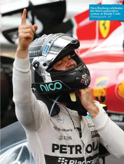  ??  ?? Nico Rosberg celebrates his third consecutiv­e victory at Monte Carlo Photograph: AP