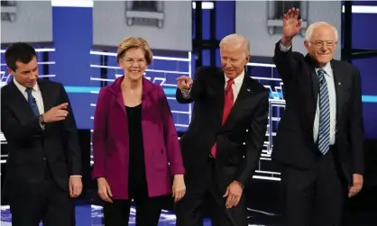  ?? Photograph: Brendan McDermid/Reuters ?? Pete Buttigieg, Elizabeth Warren, Joe Biden and Bernie Sanders at a Democratic debate in Atlanta, Georgia, on 20 November.