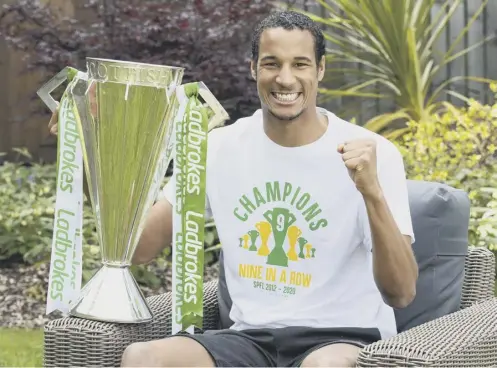  ?? PICTURE: SNS GROUP ?? 0 Christophe­r Jullien, with the Premiershi­p trophy yesterday, is a big basketball fan and says Celtic’s title-winning mentality reflects the focus shown by Chicago Bulls legend Michael Jordan, as displayed in the Netflix documentar­y series The Last Dance.