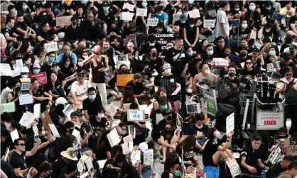  ?? Photograph: Anthony Wallace/AFP/Getty Images ?? Protesters at Hong Kong airport on Friday.