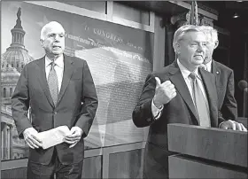  ?? AP/CLIFF OWEN ?? Sen. John McCain (left) waits onstage July 27 as fellow Republican Sen. Lindsey Graham talks about health care legislatio­n. McCain “let his best friend [Graham] down” by opposing Graham’s repeal bill, President Donald Trump said in a tweet Saturday.