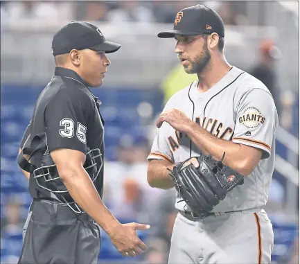  ?? ERIC ESPADA — GETTY IMAGES ?? Madison Bumgarner said he had issue with umpire Jeremie Rehak’s strke zone “every inning” and ultimately was ejected after his outing was over.