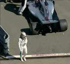  ?? SKY ?? All over: Hamilton walks away after mechanical fault