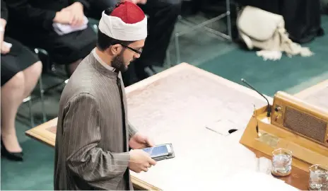  ?? TROY FLEECE ?? Imam Sheikh Mohammed prays during the opening of the 28th legislatur­e on Wednesday. This was the first time in Saskatchew­an a Muslim blessing was offered during the opening of the house. First Nations elder Betty Mckenna also offered an Indigenous blessing as MLAS returned to work.