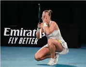  ?? Andy Wong/Associated Press ?? Anna Blinkova reacts after defeating Elena Rybakina in their second-round match at the Australian Open on Thursday.