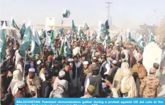  ?? —AFP ?? BALOCHISTA­N: Pakistani demonstrat­ors gather during a protest against US aid cuts at the Pakistan-Afghanista­n border post in Chaman.