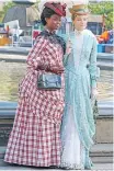  ?? The Gilded Age. ?? PEGGY (Denée Benton, left) and Marian (Louisa Jacobson) walk the streets of New York City in | HBO