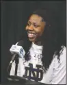  ??  ?? FINAL SHOWDOWN: (Left) Mississipp­i State’s Teaira McCowan responds to a question Saturday during a news conference in Columbus, Ohio. (Right) Notre Dame’s Arike Ogunbowale smiles during a news conference in Columbus. The Bulldogs and the Irish will...