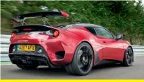  ??  ?? Focus is all on the driving, as the cabin shows; aero package, including that wing, gives up to 250kg of downforce, claims Lotus