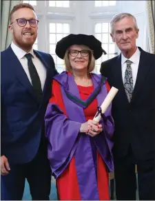  ??  ?? Helen Rochford Brennan with her son, Martin and husband, Sean.