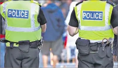  ??  ?? There have been 70 incidents of police officers being coughed at or spat on during the coronaviru­s outbreak; right, Kent police and crime commission­er Matthew Scott