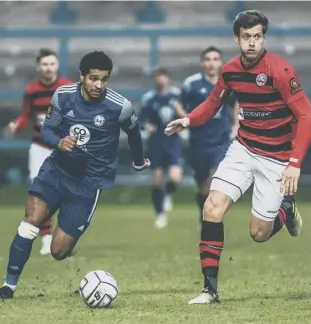  ??  ?? HOME DEFEAT: Kieran Green (left) and Jamie Allen (right) in action for Town against Maidenhead at The Shay last Saturday. Photos: Marcus Branston.