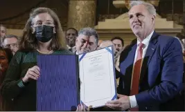  ?? MARIAM ZUHAIB — THE ASSOCIATED PRESS ?? House Speaker Kevin McCarthy, R-Calif., stands with Denise Rucker Krepp, a former advisory neighborho­od commission member, on Capitol Hill in Washington on March 10as he holds a ceremony to nullify the D.C. crime bill.