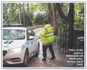  ?? ?? Police at the gates to Wildenstei­n on Wednesday. Picture: David Swift