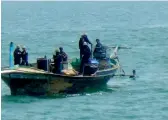  ?? —PTI ?? The Pakistani boat that was intercepte­d by Indian Navy and the Coast Guard off the coast in Porbandar on Monday.