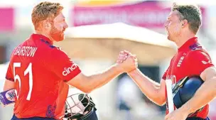  ?? AP ?? Jonny Bairstow (L) and Jos Buttler finished the run chase in just 19 balls.