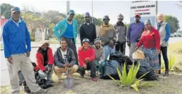  ?? Picture: ROB KNOWLES ?? MEN ON A MISSION: The men who are registered through Sikhulise Skills Developmen­t gave back to the community on Mandela Day by cleaning up their area. They are, from left, Toto Makasi, Elvis Siko, Bulelani Donile, Wellington Veto, Ivan Button, Tembekile Holiday, Sandile Gdze, Simon Magadaza, Fezekile Stengile with Sikhulise manager Gertrude Sigonyela and volunteer Lynne Nettelton